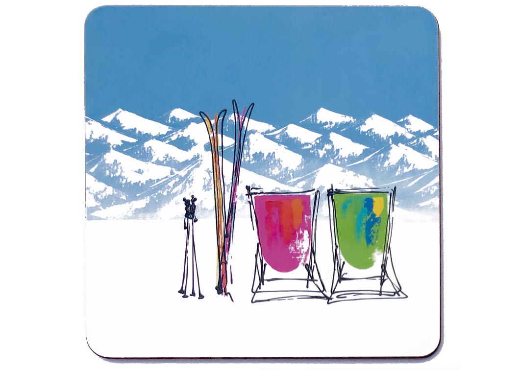 Square art placemat of 2 deckchairs in the snow with skis, poles and mountain backdrop by artist Hannah van Bergen  