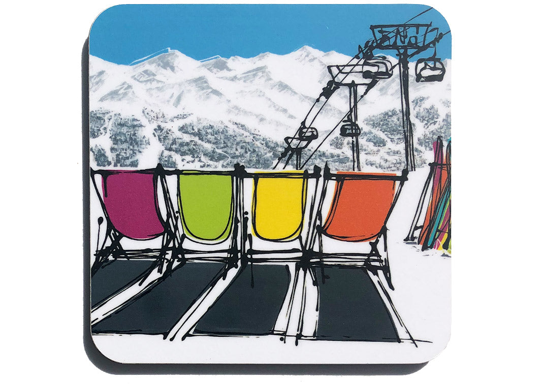 Colourful art coaster of 4 deckchairs in the snow with skis, ski lift and mountain backdrop by artist Hannah van Bergen