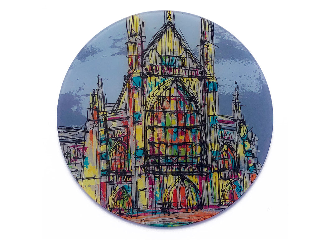 Round glass platter / worktop saver with colourful artwork of Winchester Cathedral by artist Hannah van Bergen