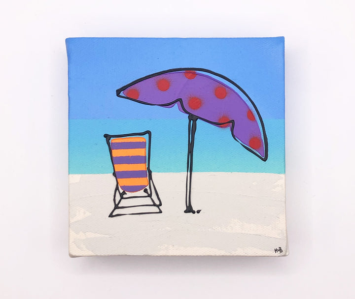 Original textured mini canvas painting of a colourful deckchair and parasol on the beach with blue sky by artist Hannah van Bergen