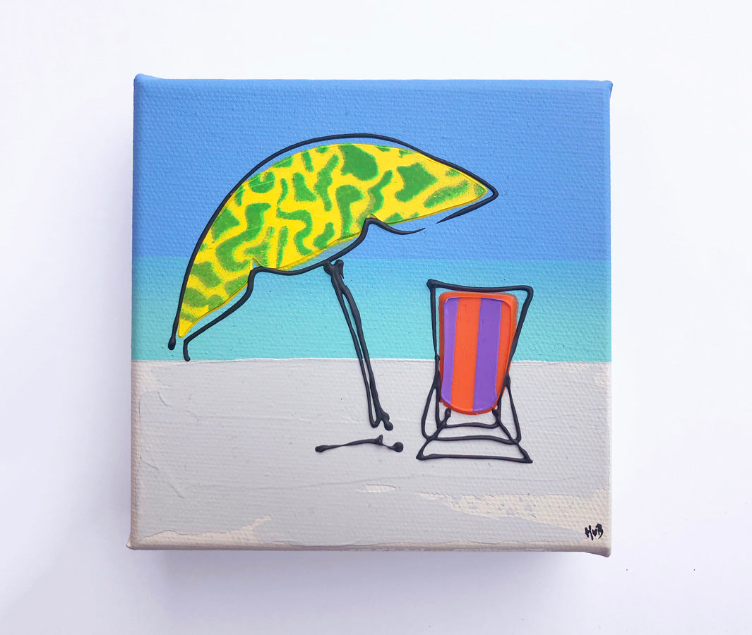 Original textured mini canvas painting of a colourful deckchair and parasol on the beach with blue sky by artist Hannah van Bergen