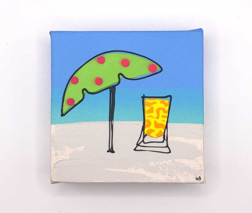 Original textured mini canvas painting of a colourful deckchair and parasol on the beach with blue sky by artist Hannah van Bergen