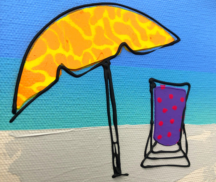 Close up of original textured mini canvas painting of a colourful deckchair and parasol on the beach with blue sky by artist Hannah van Bergen