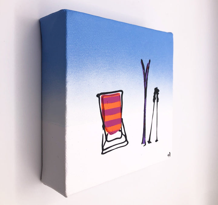 Original textured mini canvas painting of a colourful deckchair, skis and poles in the snow with blue sky by artist Hannah van Bergen