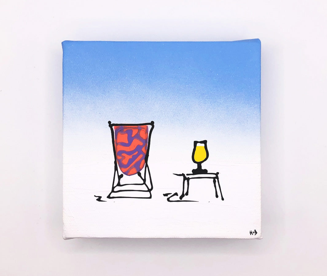 Original textured mini canvas painting of a colourful deckchair in the snow with a drink and blue sky by artist Hannah van Bergen