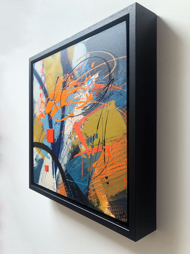 Original textured industrial abstract painting with blues, bright orange, mustard and black by artist Hannah van Bergen. Spray paint and thick paint strokes. Framed in black frame.