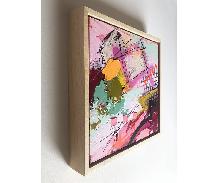 Original textured industrial abstract painting with pinks, maroon, raspberry, peach colour, mint, mustard and black by artist Hannah van Bergen. Spray paint and thick paint strokes. Framed in natural wood frame.