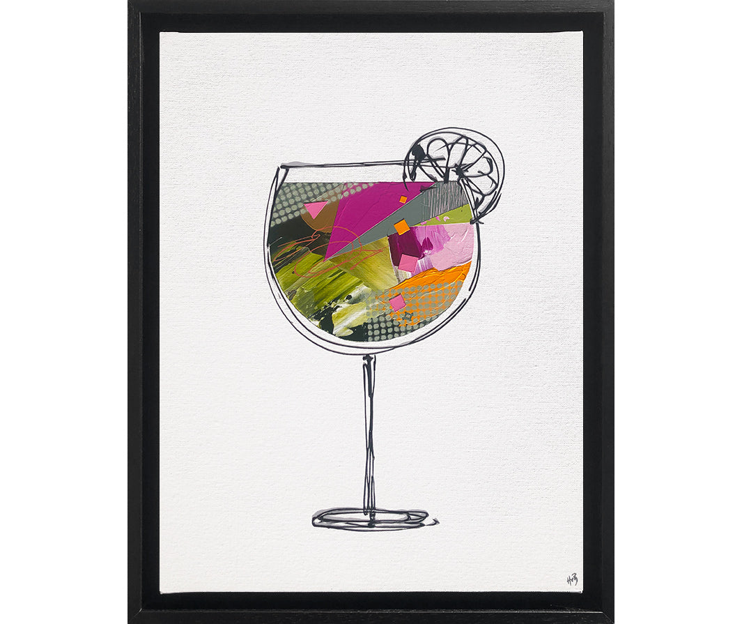 Framed painting of a colourful, textured cocktail glass on a white background with a black frame by artist Hannah van Bergen
