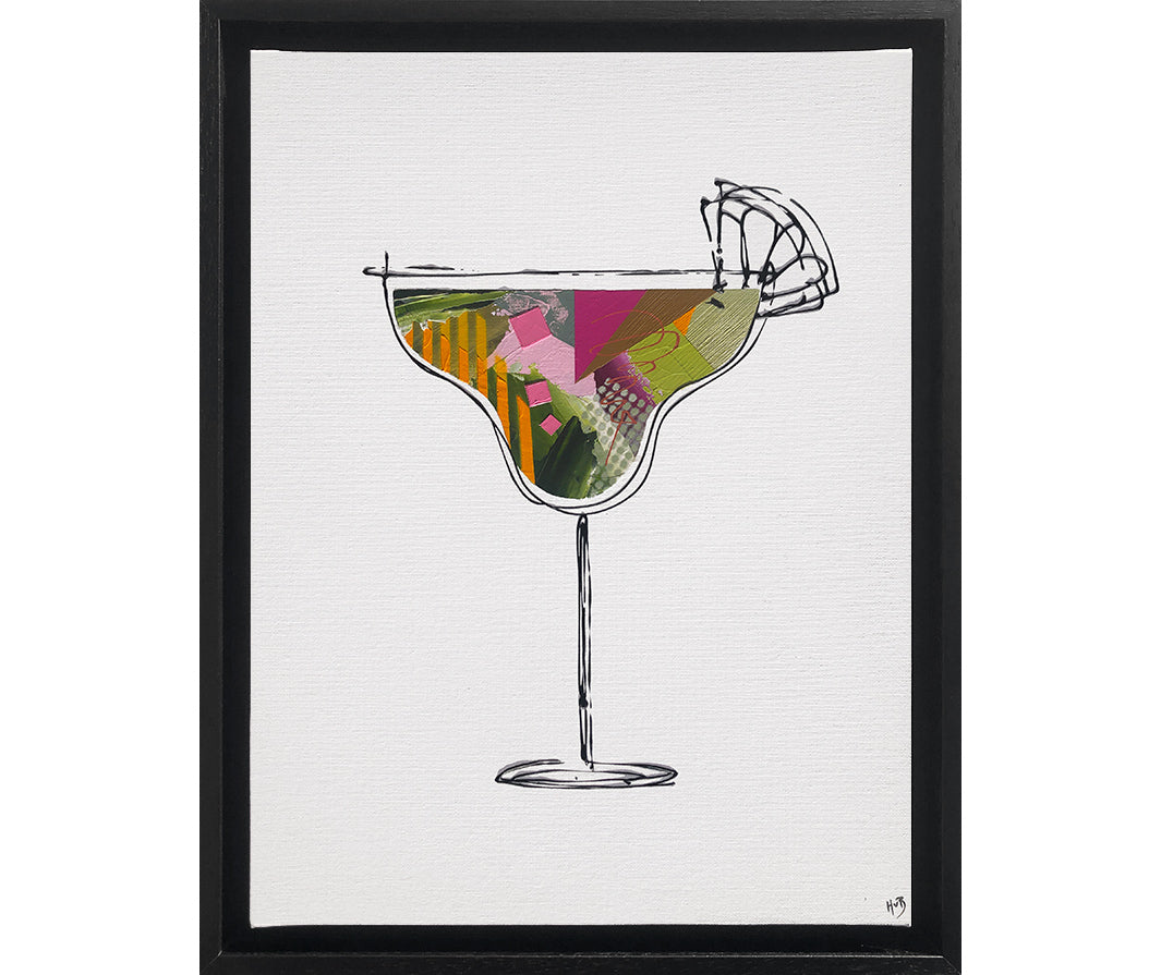 Framed painting of a colourful, textured cocktail glass on a white background with a black frame by artist Hannah van Bergen