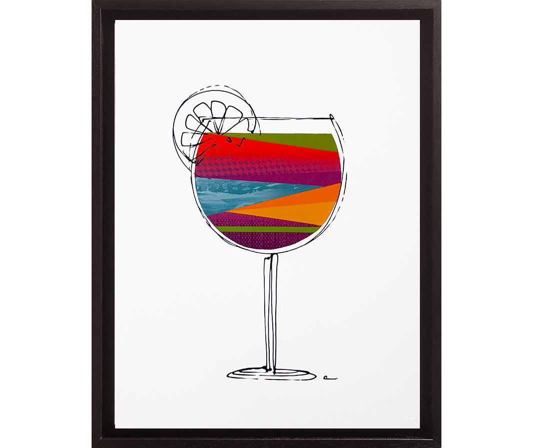 Framed painting of a colourful, textured cocktail glass on a white background with a black frame by artist Hannah van Bergen