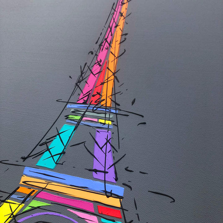 Close up of original colourful painting of Eiffel Tower Paris with dark grey background by artist Hannah van Bergen
