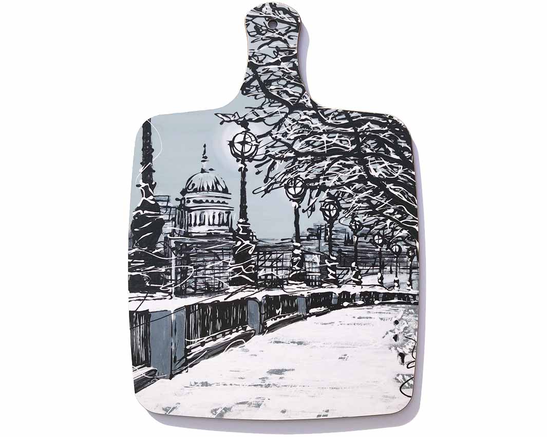 Chopping board with handle showing St Paul's Cathedral from Southbank in the snow by artist Hannah van Bergen