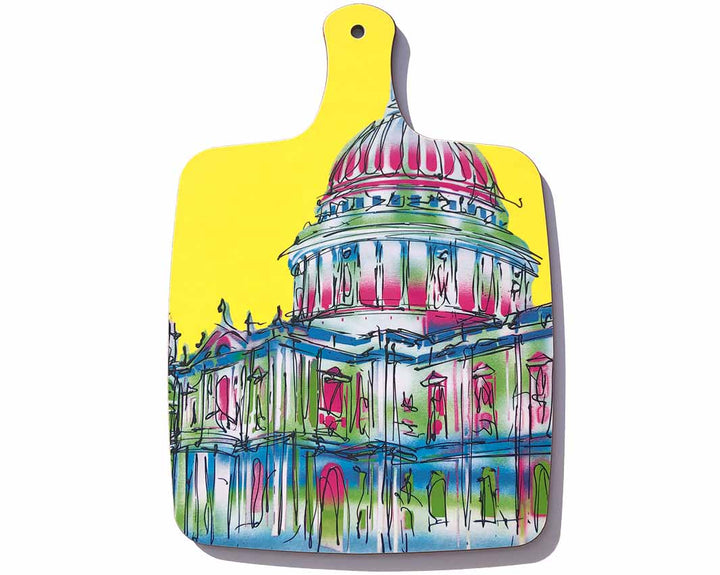 Bright yellow chopping board with handle showing St Paul's Cathedral by artist Hannah van Bergen