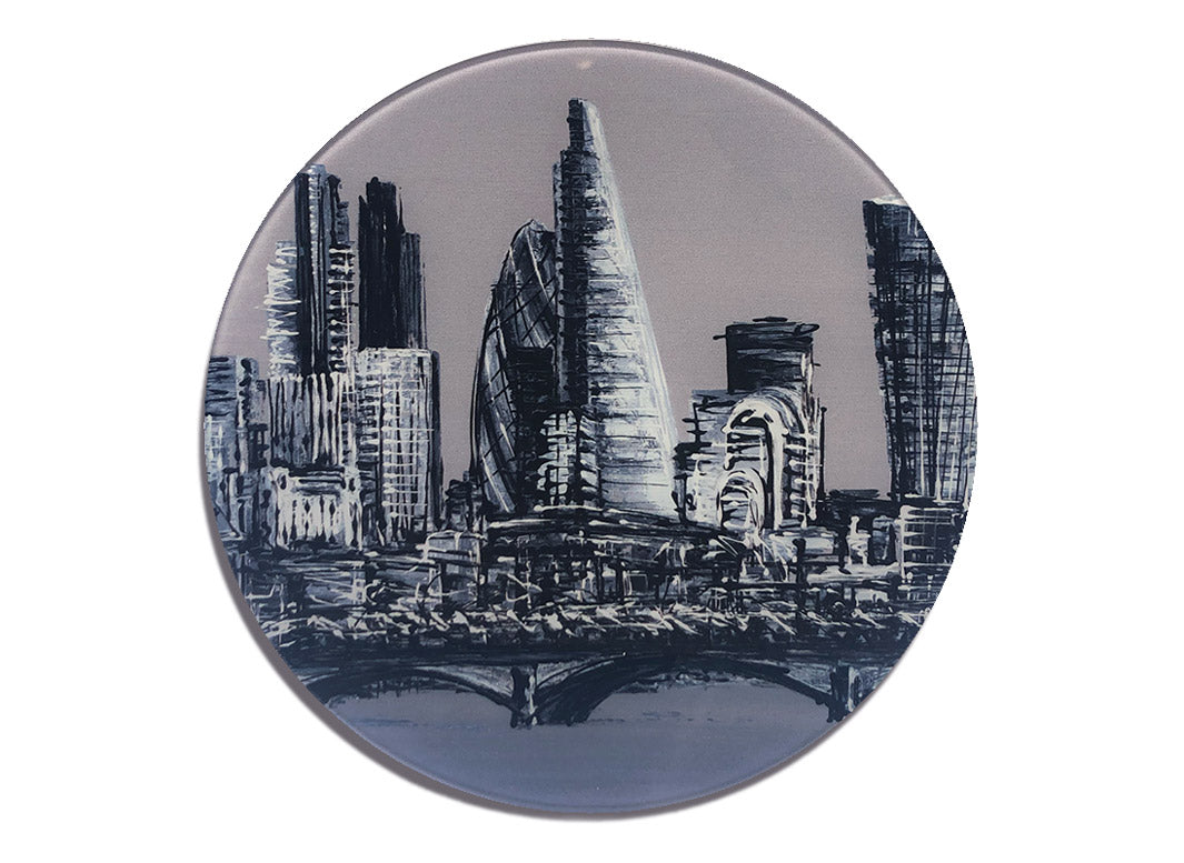Round glass platter / worktop saver with greyscale artwork of skyscrapers in London including the Gherkin and Cheesegrater with Blackfriars Bridge over the Thames by artist Hannah van Bergen