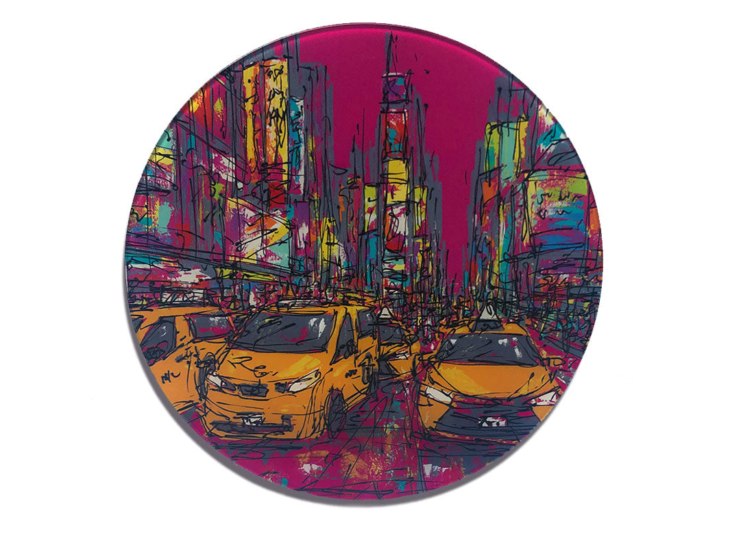 Round glass platter / worktop saver with artwork of Times Square with billboards on a pink background and yellow taxis in the foreground by artist Hannah van Bergen